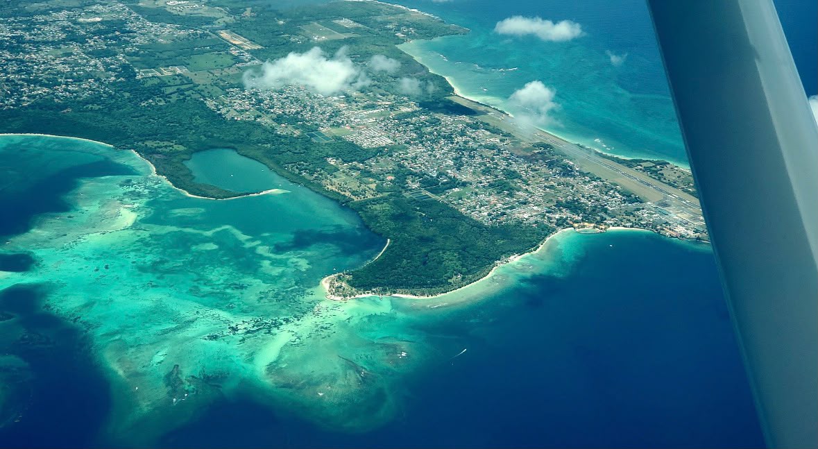 Aerial view of Caribbean coastline and reef from the Cessna 172